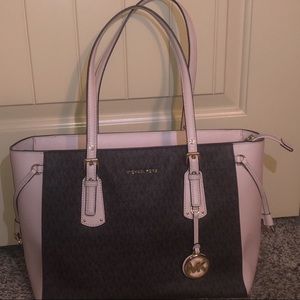 Purse-Brown leather with MK logo with pink trimming and Gold accents.